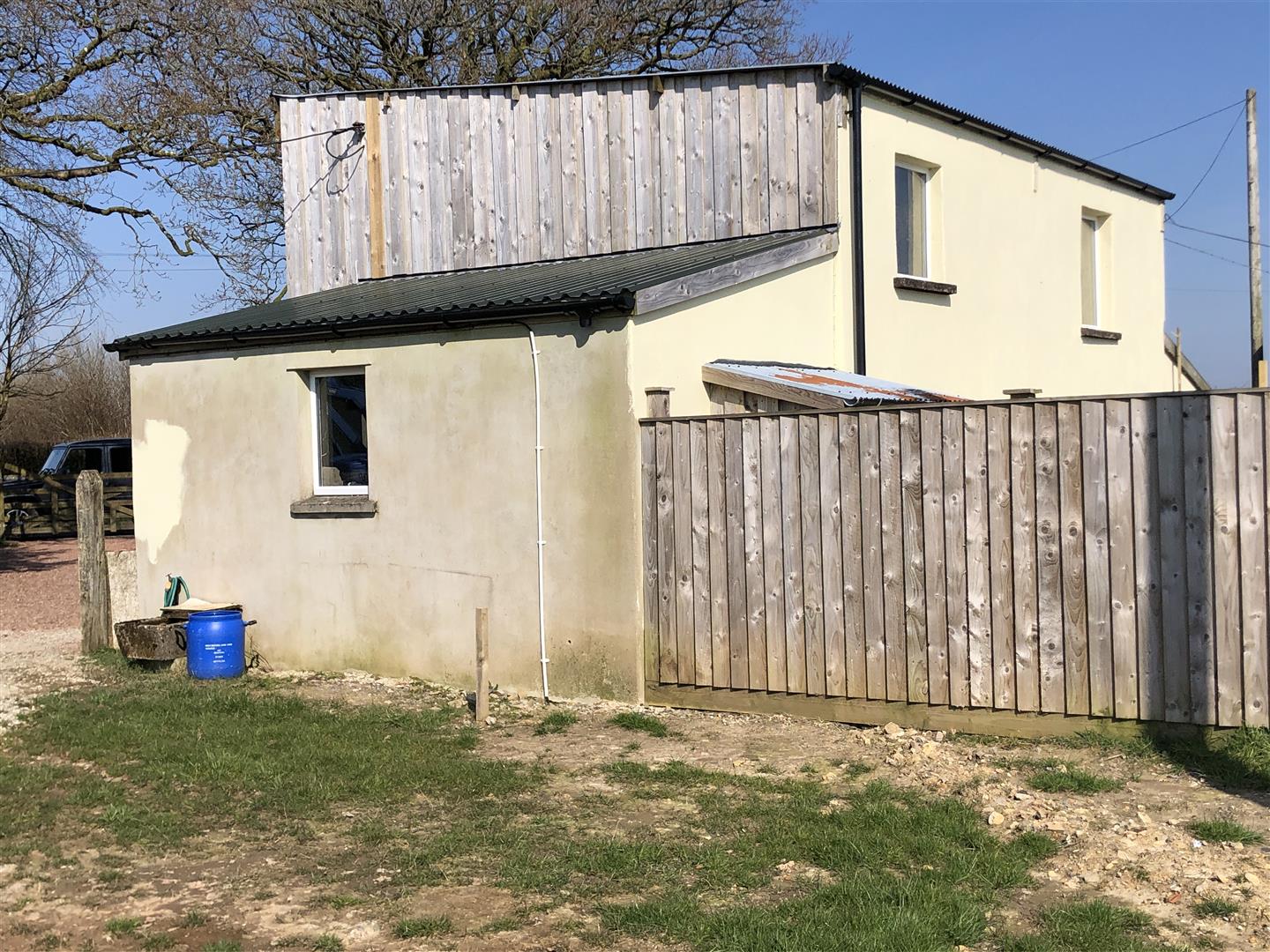 A REDUNDANT RURAL BUILDING WITH UNRESTRICTED PLANNING PERMISSION FROM