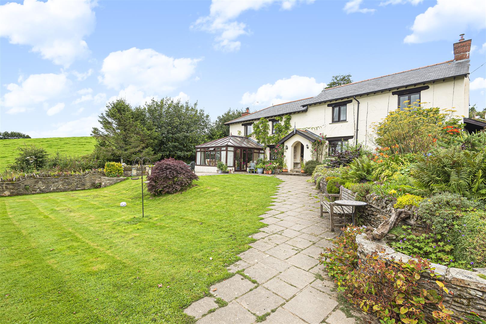 SITUATED NEAR TO THE NATIONAL TRUST ARLINGTON ESTATE AND THE EXMOOR NATIONAL PARK THIS IS A