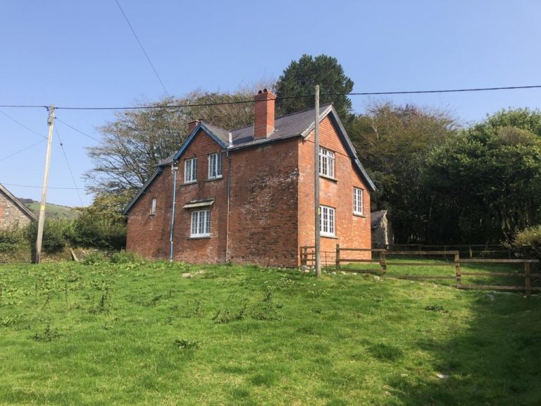 A RARE OPPORTUNITY TO PURCHASE A SOUTH FACING EXMOOR BRICK BUILT 4 BED