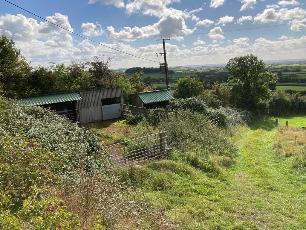 A WELL LOCATED SMALLHOLDING COMPRISING 5 ACRES OF AGRICULTURAL LAND WITH PLANNING PERMISSION FOR